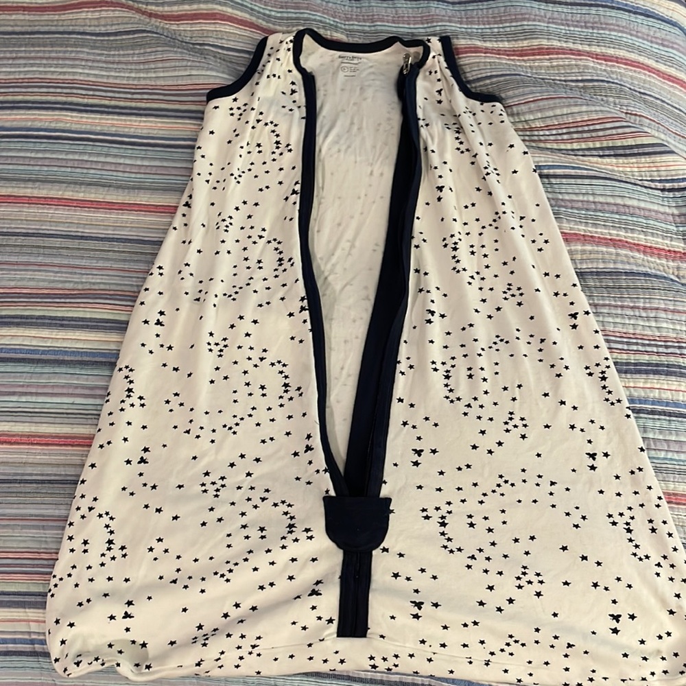 Burt’s Bees sleep sack. Size large. Material is Cotton and is really soft.